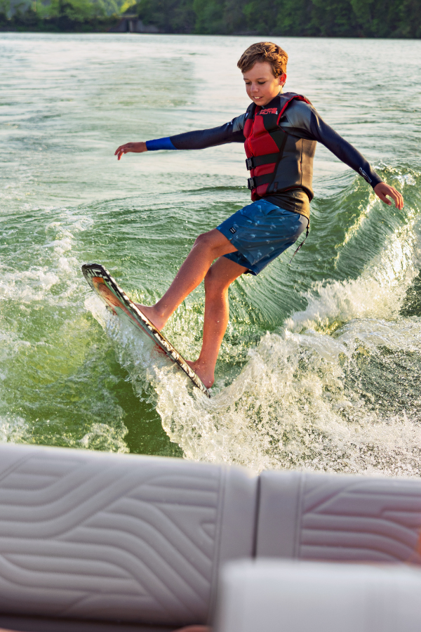 Wakesurfing behind the SDX 230