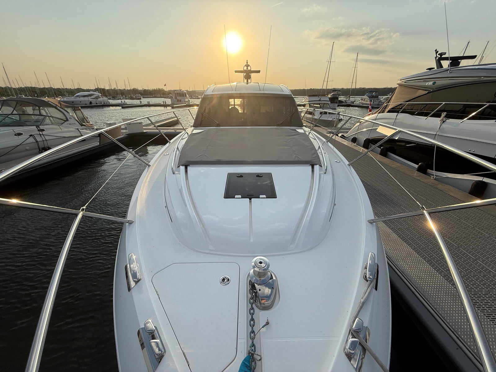 Princess V50 foredeck and sunpad at sunset