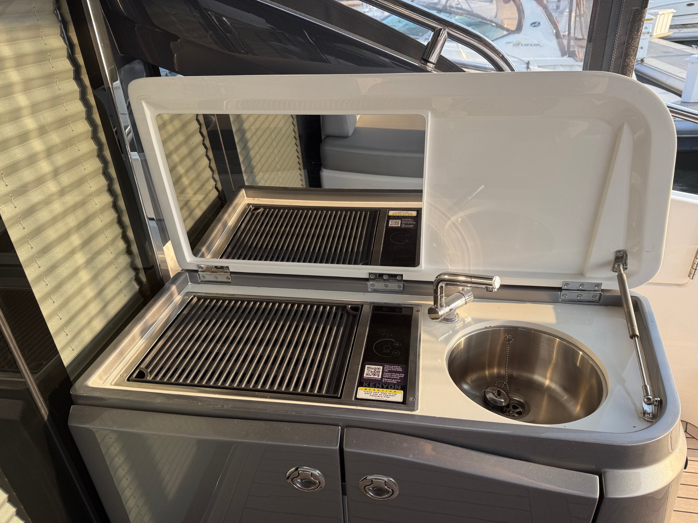 Princess V50 cockpit wet bar with grill and sink