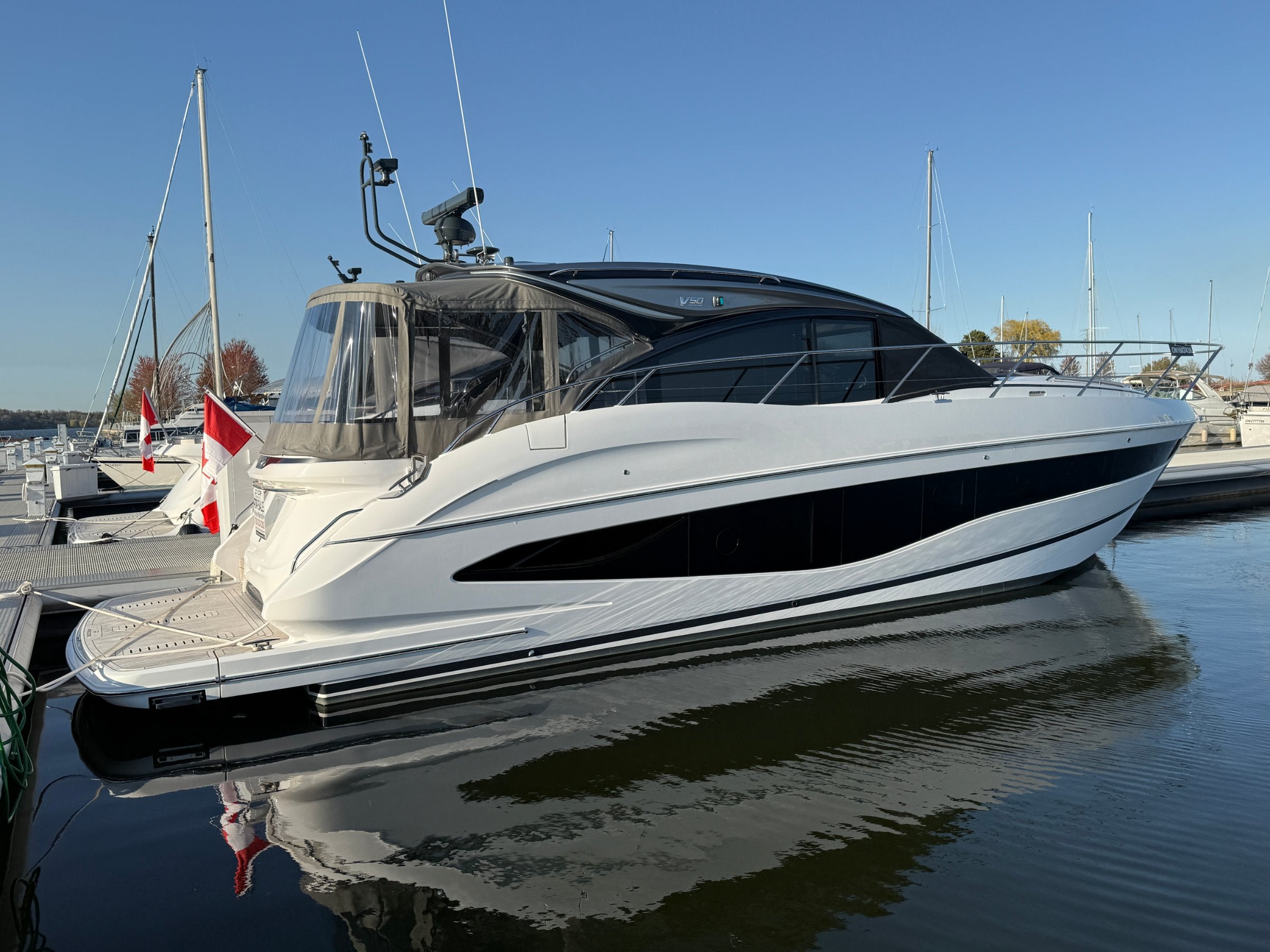 Princess V50 at the dock at golden hour